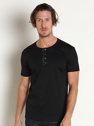 Model in black Nasty Pig Axle Henley Shirt