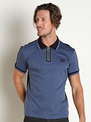 Model in denim blue/black Nasty Pig Axle Polo Shirt