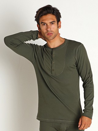 Model in khaki Modus Vivendi Organic Henley Longsleeve Shirt