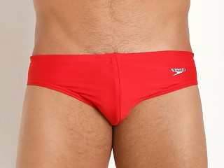 Model in us red Speedo PowerFlex Eco Solar 1" Swim Brief