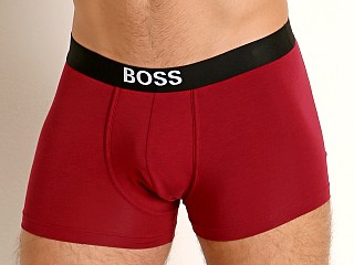 Model in burgundy Hugo Boss Identity Trunk