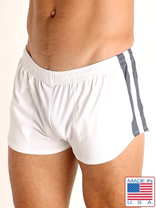 Model in white/grey LASC Performance Mesh Running Shorts