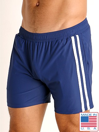 Model in navy/white LASC Performance Mesh Active Shorts