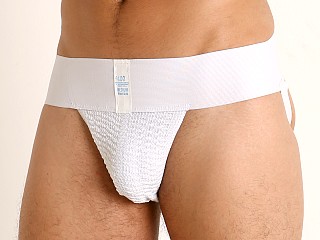 Model in white AT Surgical Athletic Supporter