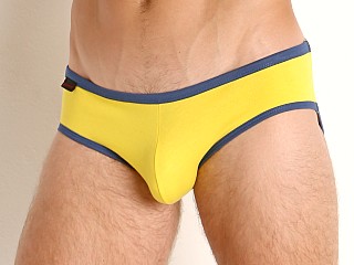 Model in yellow Jack Adams Atlas Brief