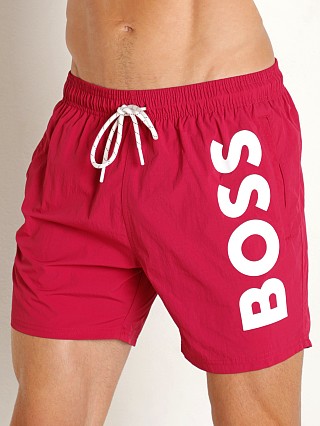 Model in fuchsia Hugo Boss Octopus Swim Shorts