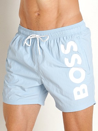 Model in sky blue Hugo Boss Octopus Swim Shorts