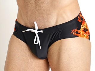 Model in black Nasty Pig Flame Swim Bikini