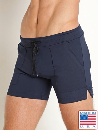 Model in navy LASC 5" Sport Shorts