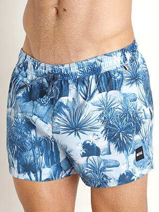 Model in blue Hugo Boss Salmon Swim Shorts