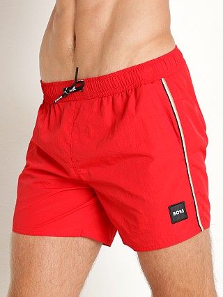 Model in red Hugo Boss Lobster Swim Shorts