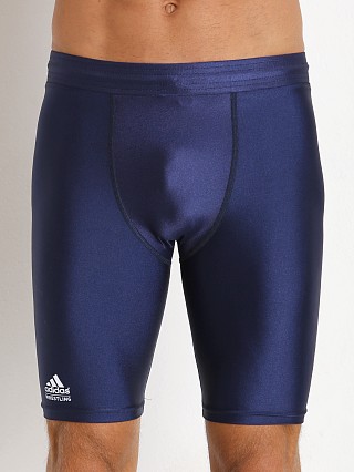 Model in navy Adidas Wrestling Compression Short