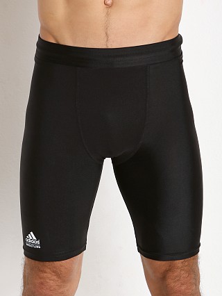 Model in black Adidas Wrestling Compression Short