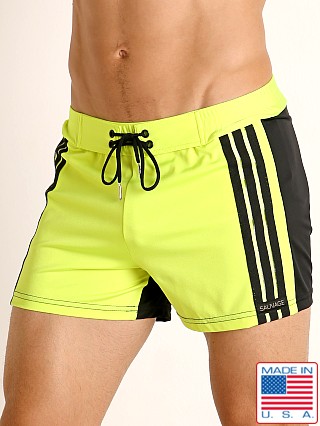 Model in lime/black Sauvage Retro Stripes Swim Trunk