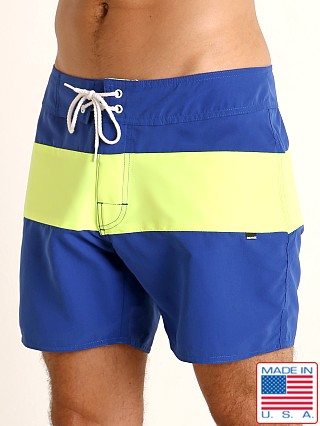 Model in royal/lime Sauvage Miami Brights Board Shorts