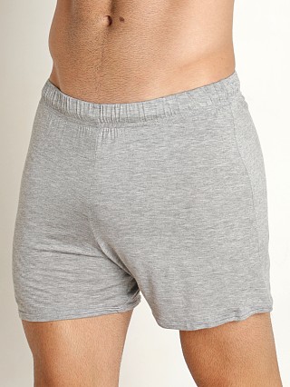 Model in grey Mckillop Push Whisper Shorts