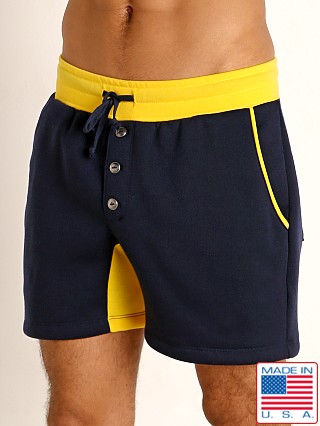 Model in navy/gold LASC Fleece Colorblock Drawstring Shorts