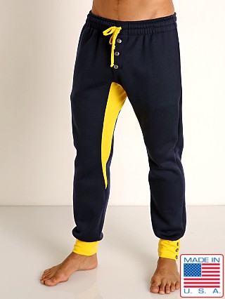 Model in navy/gold LASC Fleece Colorblock Drawstring Pant