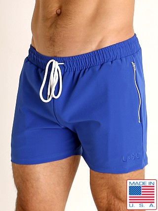 Model in royal LASC Zippered Pockets Stretch Woven Gym Shorts