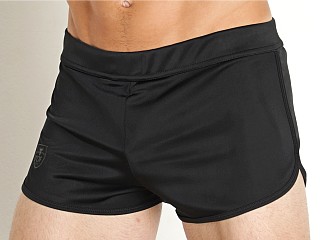 Model in black TOF Paris Runner Shorts