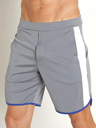 Model in grey TOF Paris Gym Long Shorts