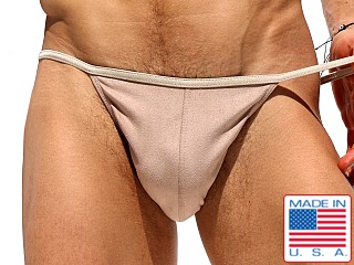 Model in dune Rufskin Joey Stretch "Suede" Cheeky Euro Brief