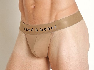 Model in tan Skull & Bones Just The Bones Thong