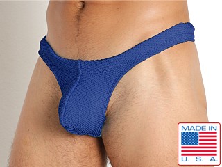 Model in denim Rick Majors Ripple Nylon Swim Thong