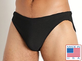 Model in black Rick Majors Ripple Nylon Super Low Rise Swim Brief