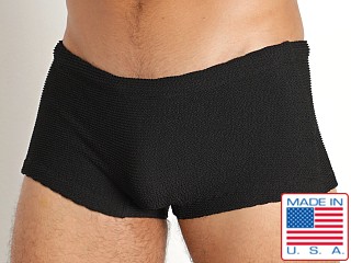 Model in black Rick Majors Ripple Nylon Low Rise Swim Trunk