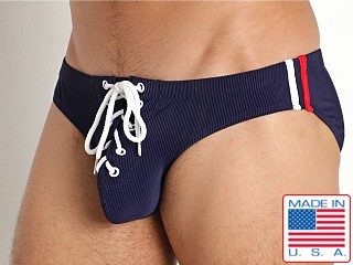 Model in navy Rick Majors Lace-Up Low Rise Swim Brief