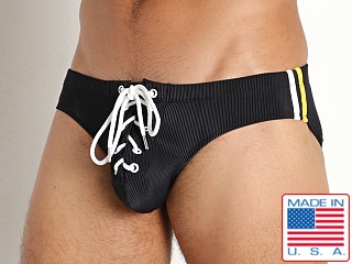 Model in black Rick Majors Lace-Up Low Rise Swim Brief