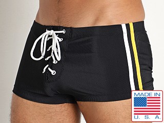 Model in black Rick Majors Lace-Up Low Rise Swim Trunk