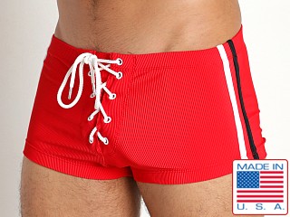 Model in red Rick Majors Lace-Up Low Rise Swim Trunk