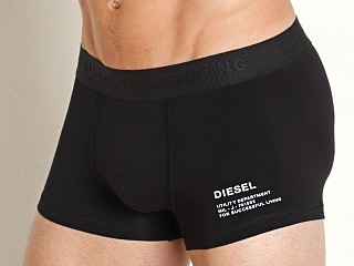 Model in black Diesel Damien Trunk