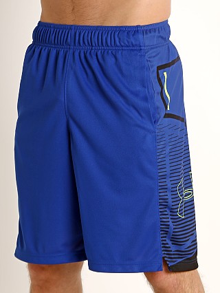 Model in royal/black Under Armour Baseline Practice Short