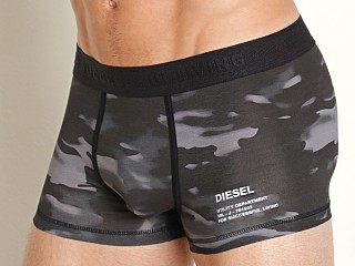 Model in black camo Diesel Damien Trunk