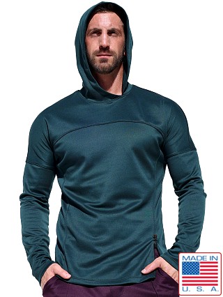 Model in emerald Rufskin Pro Fitted Pull-Over Hoodie