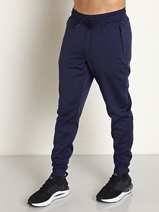 Model in midnight navy Under Armour Fleece Twist Pants