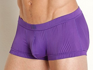 Model in purple Modus Vivendi Curved Line Trunk