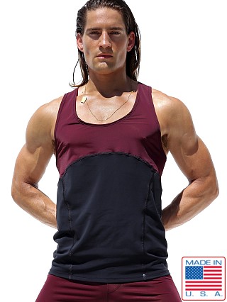 Model in black Rufskin Trace Anatomic Stretch Sport Tank Top