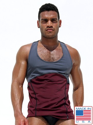 Model in maroon Rufskin Trace Anatomic Stretch Sport Tank Top