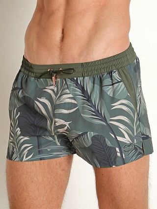 Model in green 2eros S50 Swim Shorts Hawaiian Forest Print