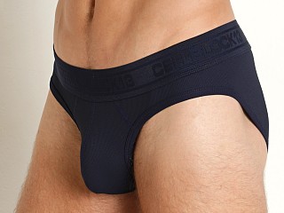 Model in navy Cell Block 13 Brigade Brief