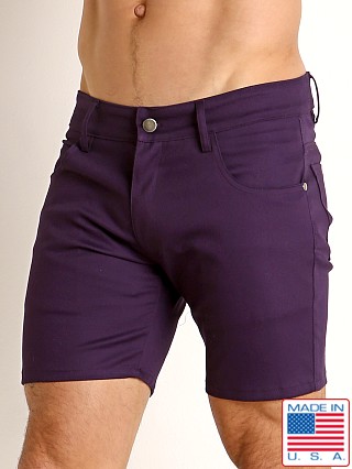 Model in eggplant LASC Cotton Twill 5-Pocket Shorts