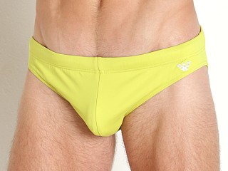 Model in acid apple Emporio Armani Embroidery Logo Low Swim Brief