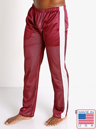 Model in burgundy/white LASC Reversible Athletic Mesh Pants