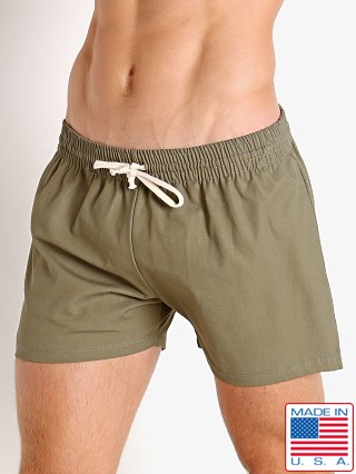 Model in army LASC Canvas Utility Sling Shorts