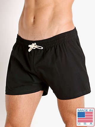 Model in black LASC Canvas Utility Sling Shorts