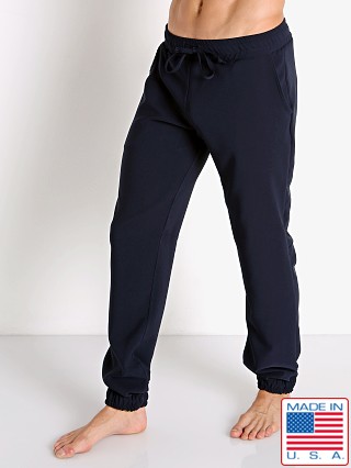 Model in navy LASC Stretch Tech Travel Pants